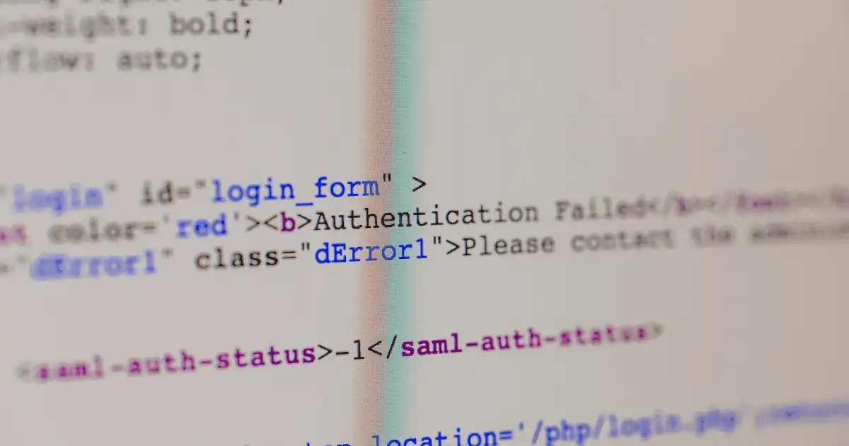Picture of a computer screen showing HTML code to represent I.T work.